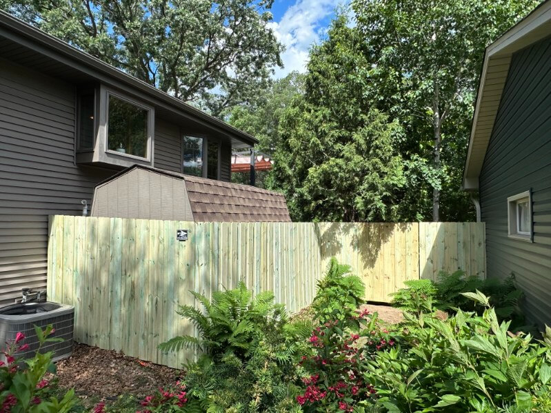 Green Treated Privacy Fence installed in Mounds View MN by Arrow Fence Co Green Treated Privacy Fence installed in Mounds View MN by Arrow Fence Co