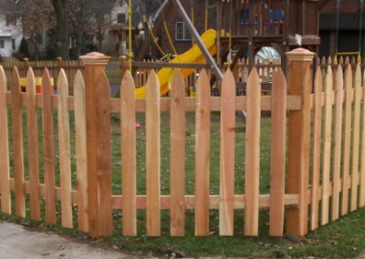 Gothic Picket Cedar Fence w/ Copper Top Caps