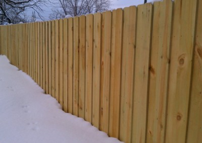 Green Treated Board on Board Fence Outside View